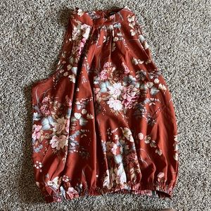Large high neck tank. Rust color with flowers.